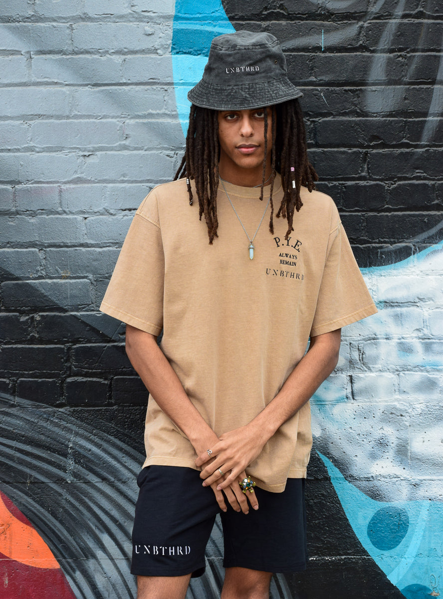100% COTTON OVERSIZED UNISEX SHIRTS. TAN COLOR. P.Y.E. LOGO EMBROIDERED. 